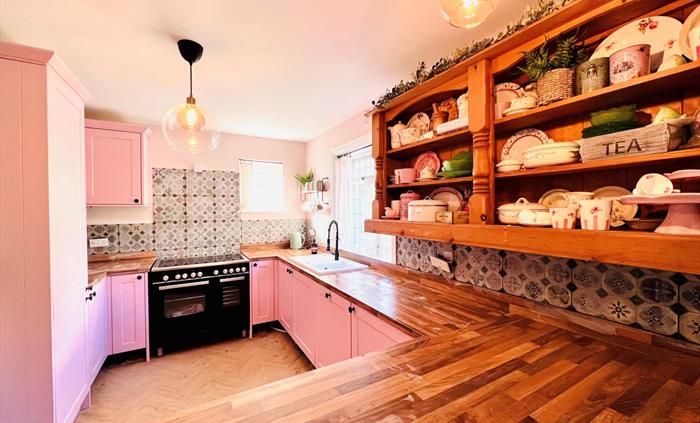 There is ample space within our large kitchen to prepare that family feast!